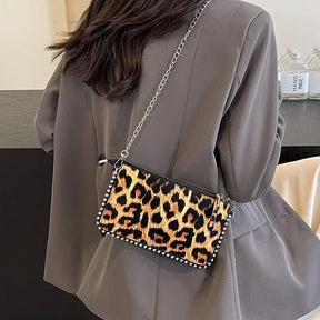 BOLSA TIRACOLO ANIMAL PRINT